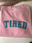 Tired pink jumper